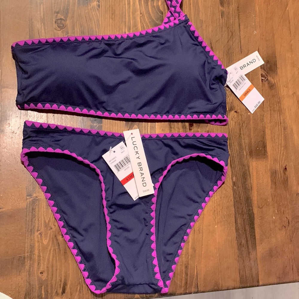 Gorgeous Lucky Brand two piece swim suit Navy with magenta details NWT.